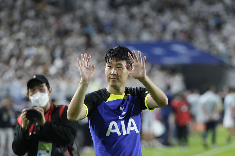 Tottenham Hotspur's Son Heung-min greets football fans after the pre-season soccer match between Tottenham Hotspur FC and Sevilla FC at Suwon World Cup Stadium in Suwon, South Korea, Saturday, July 16. Picture: AP Photo/Ahn Young-joon Tottenham Hotspur's Son Heung-min greets football fans after the pre-season soccer match between Tottenham Hotspur FC and Sevilla FC at Suwon World Cup Stadium in Suwon, South Korea, Saturday, July 16. Picture: AP Photo/Ahn Young-joon