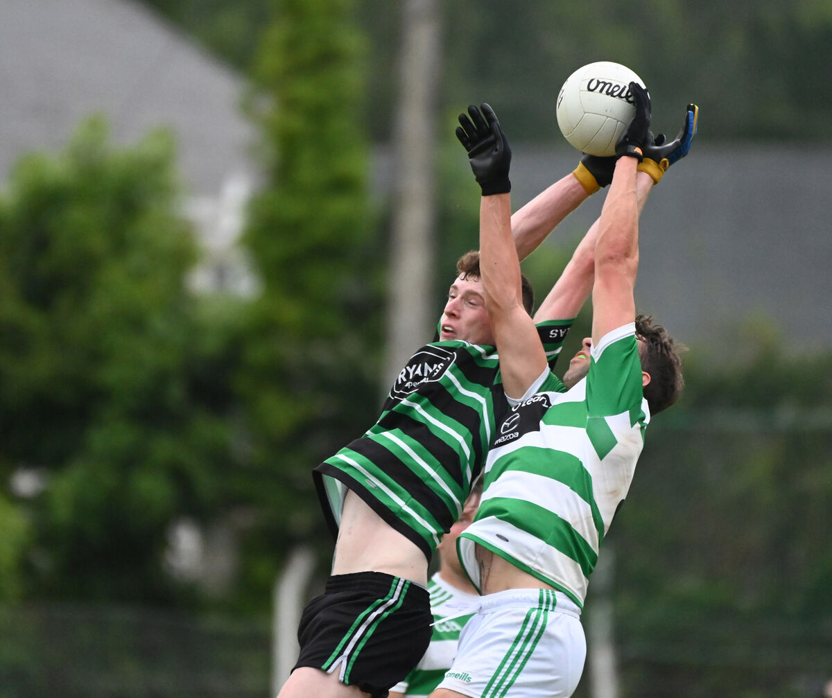 Douglas' Adam Cantwell goes high with Valley Rovers' Darragh Murphy. Picture: Eddie O'Hare Douglas' Adam Cantwell goes high with Valley Rovers' Darragh Murphy. Picture: Eddie O'Hare