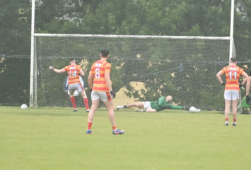  Newcestown's David Buckley has his penalty saved by Nemo Rangers' Micheál Aodh Martin. Picture: David Keane.