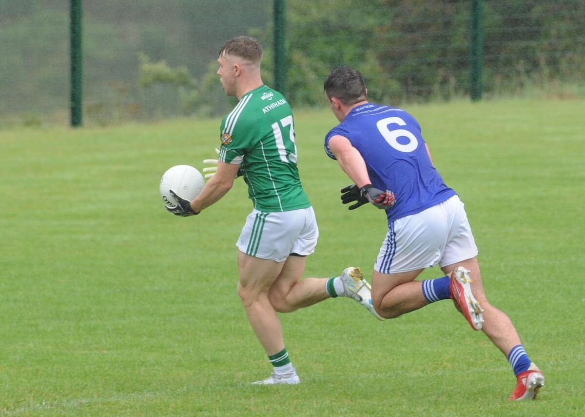 Aghada's Aaron Berry racing through to score a goal against Bantry Blues despite the efforts of Billy Foley. Picture: Denis Minihane. Aghada's Aaron Berry racing through to score a goal against Bantry Blues despite the efforts of Billy Foley. Picture: Denis Minihane.