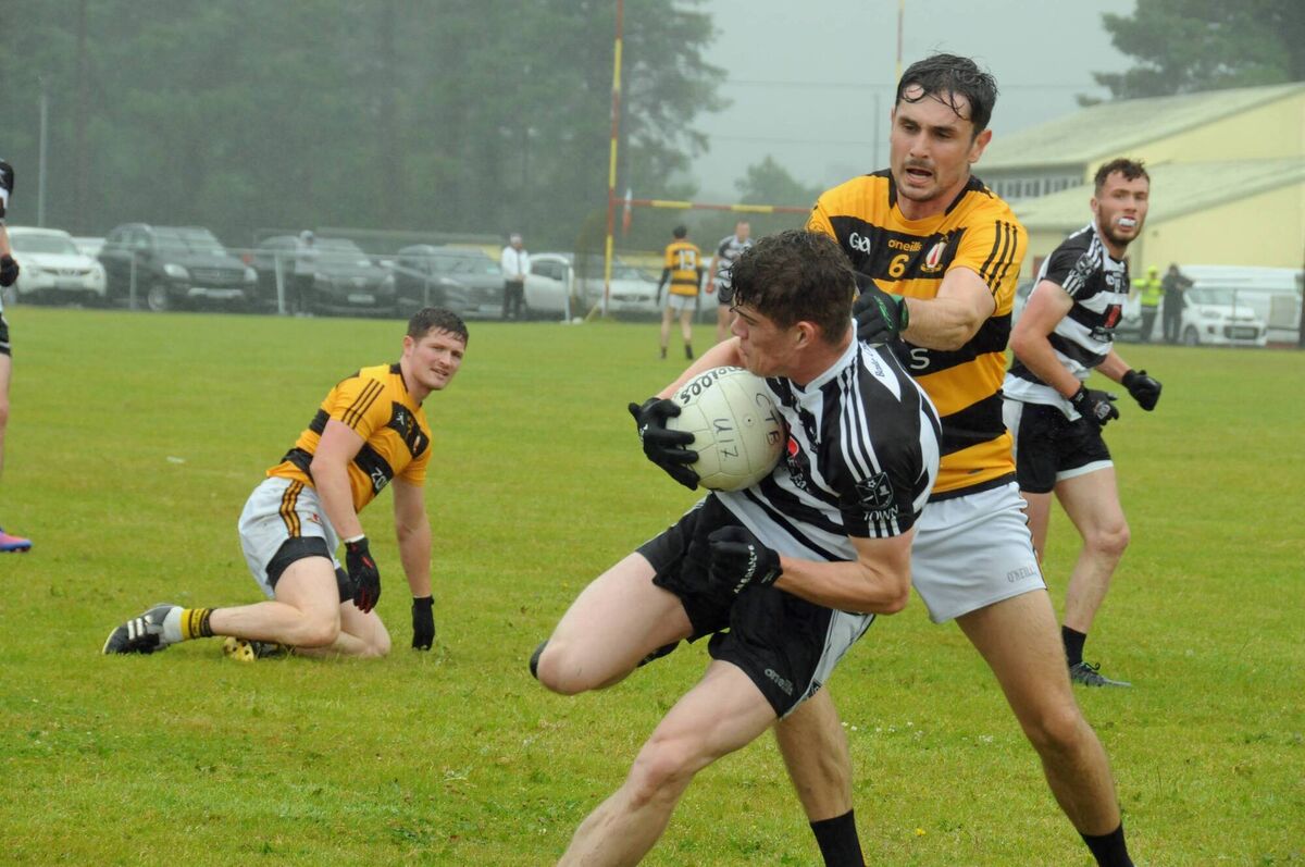 Lee Kelly of Castletownbere gets past James Morrissey of Na Piarsaigh during the Bon Secours PIFC game in Aughaville. Pic Tony McElhinney Lee Kelly of Castletownbere gets past James Morrissey of Na Piarsaigh during the Bon Secours PIFC game in Aughaville. Pic Tony McElhinney