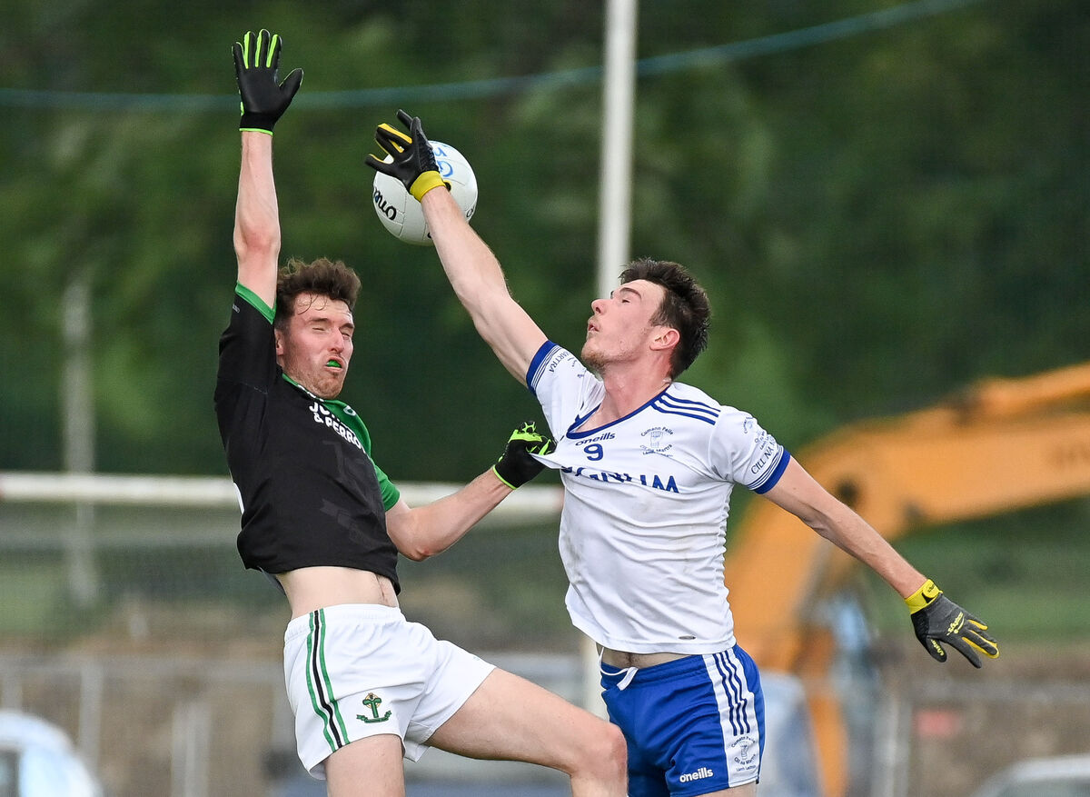 Cill Na Martra's Gearoid O Goillidhe and Nemo Rangers' James O'Donovan, compete in the air. Picture: David Keane. Cill Na Martra's Gearoid O Goillidhe and Nemo Rangers' James O'Donovan, compete in the air. Picture: David Keane.
