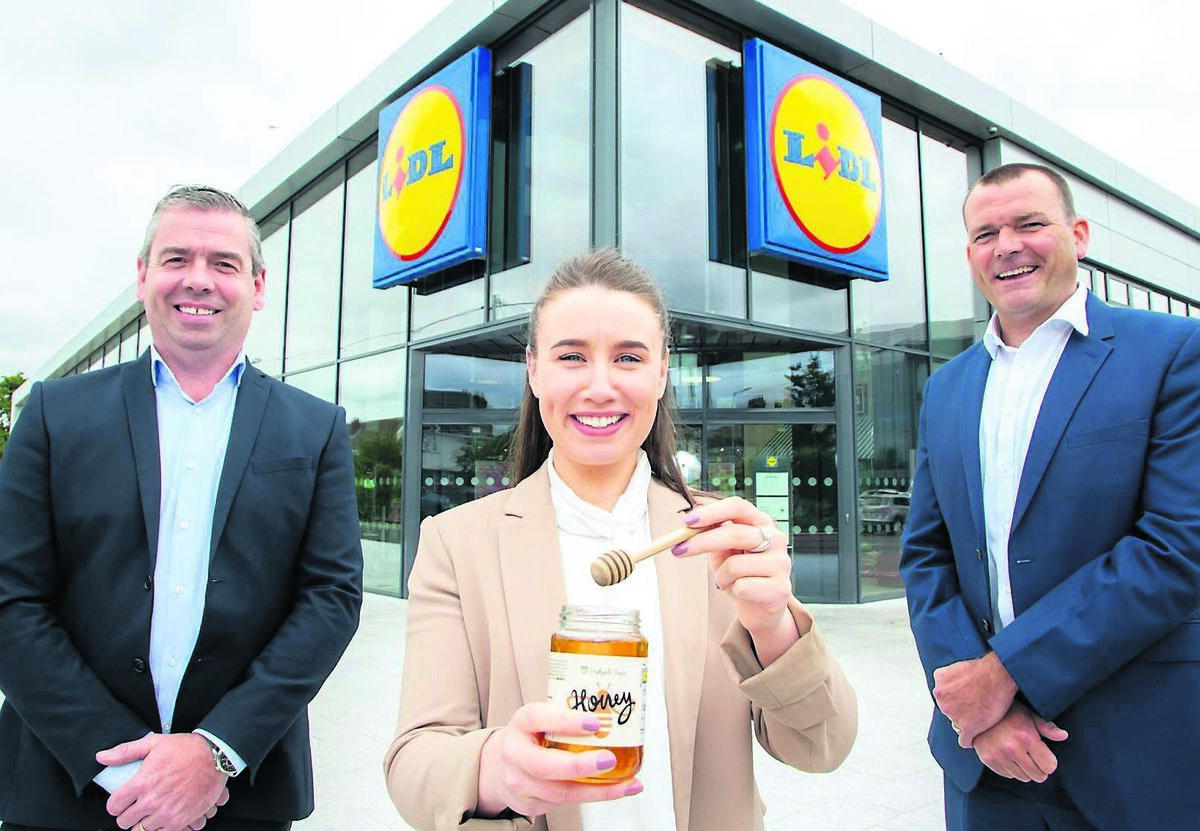 Con Healy, director at Healy’s Honey; Claire Mulrennan, buyer at Lidl Ireland and Northern Ireland, and Martin Ormonde, export sales executive at Healy’s Honey, as the Cork company signs a deal with Lidl. Picture: Keith Arkins Media Con Healy, director at Healy’s Honey; Claire Mulrennan, buyer at Lidl Ireland and Northern Ireland, and Martin Ormonde, export sales executive at Healy’s Honey, as the Cork company signs a deal with Lidl. Picture: Keith Arkins Media