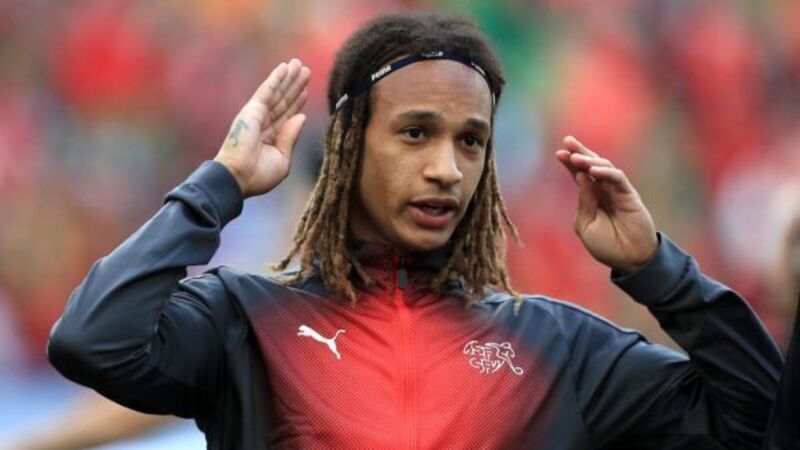 Fulham sign Switzerland international Kevin Mbabu from Wolfsburg