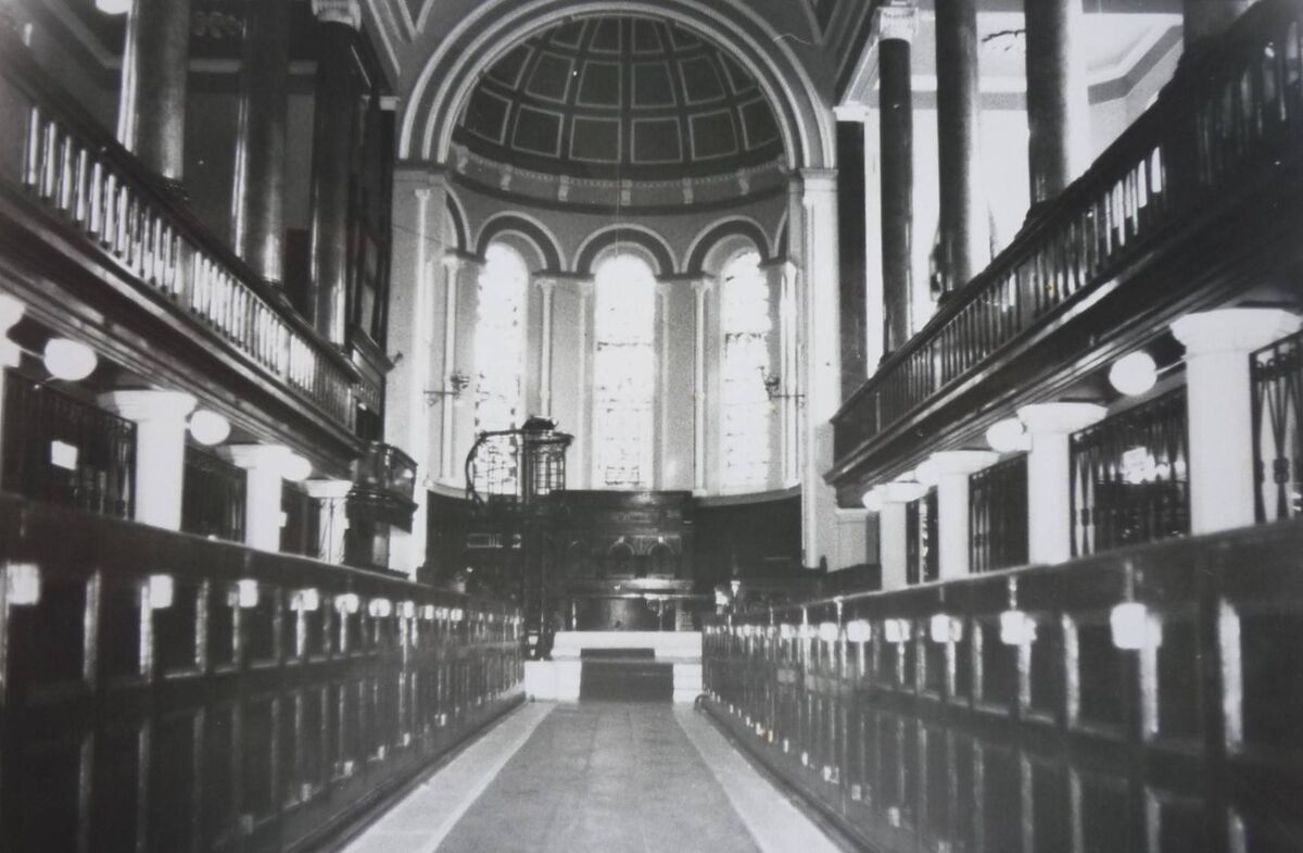 The magnificent interior of Christ Church in 1983; showing its pews, pulpit, apse, organ, scaglioa columns with its aisle leaning southwards. Courtesy: Richard T. Cooke 1983. 