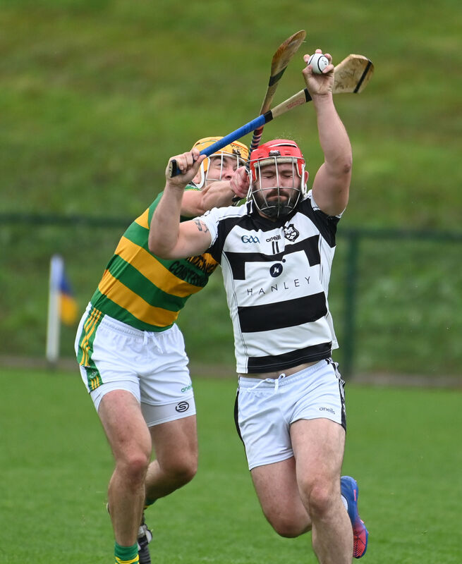 Ballyhea's Pa O'Callaghan wins the sliotar from Ballymartle's Seamus Corry. Picture: Eddie O'Hare