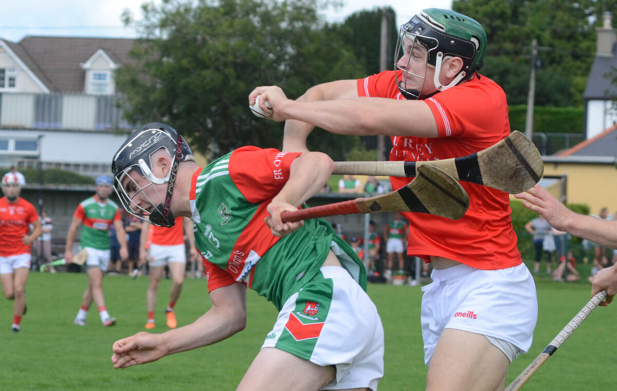 Blarney's Mark Coleman clashes with Fr O'Neill's John Millerick. Picture: Howard Crowdy Blarney's Mark Coleman clashes with Fr O'Neill's John Millerick. Picture: Howard Crowdy
