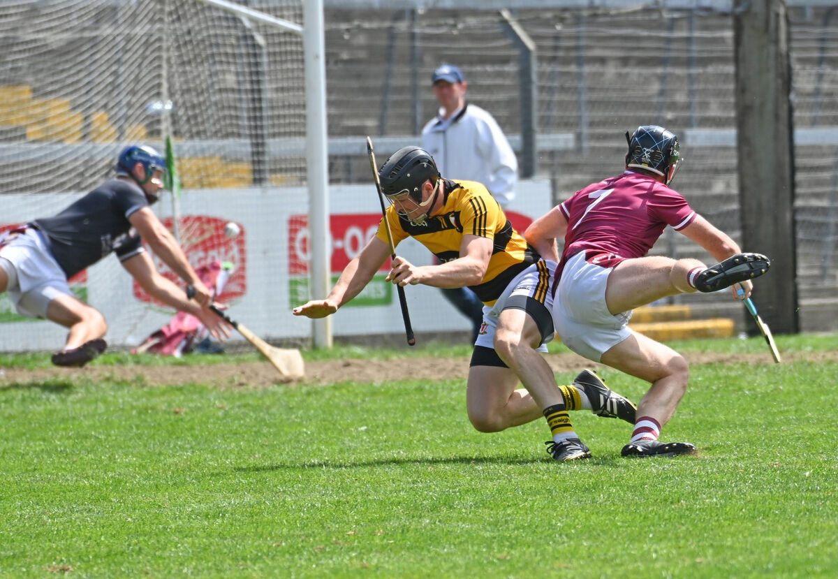 Na Piarsiagh's Patrick Rourke hammers home his goa past Bishopstown's Ken O'Halloran and Paul Honohan. Picture: Eddie O'Hare Na Piarsiagh's Patrick Rourke hammers home his goa past Bishopstown's Ken O'Halloran and Paul Honohan. Picture: Eddie O'Hare
