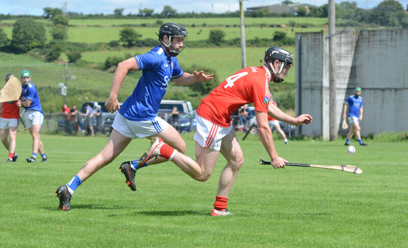 Kilworth's Jeromy Saich battling Ballinhassig's Michael Collins. Picture: Howard Crowdy Kilworth's Jeromy Saich battling Ballinhassig's Michael Collins. Picture: Howard Crowdy
