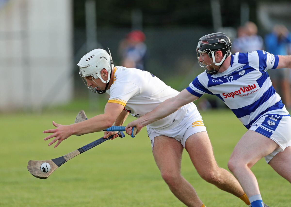 Ciaran McCarthy, Bandon, tries to hold off Kieran Rice, Inniscarra. Picture: Jim Coughlan. Ciaran McCarthy, Bandon, tries to hold off Kieran Rice, Inniscarra. Picture: Jim Coughlan.