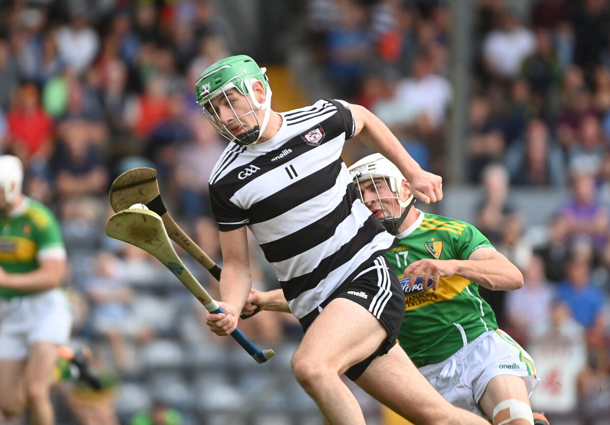 Ross O'Regan, Midleton, gets past defender Cathal Bowles, Newtownshandrum. Picture: Larry Cummins Ross O'Regan, Midleton, gets past defender Cathal Bowles, Newtownshandrum. Picture: Larry Cummins