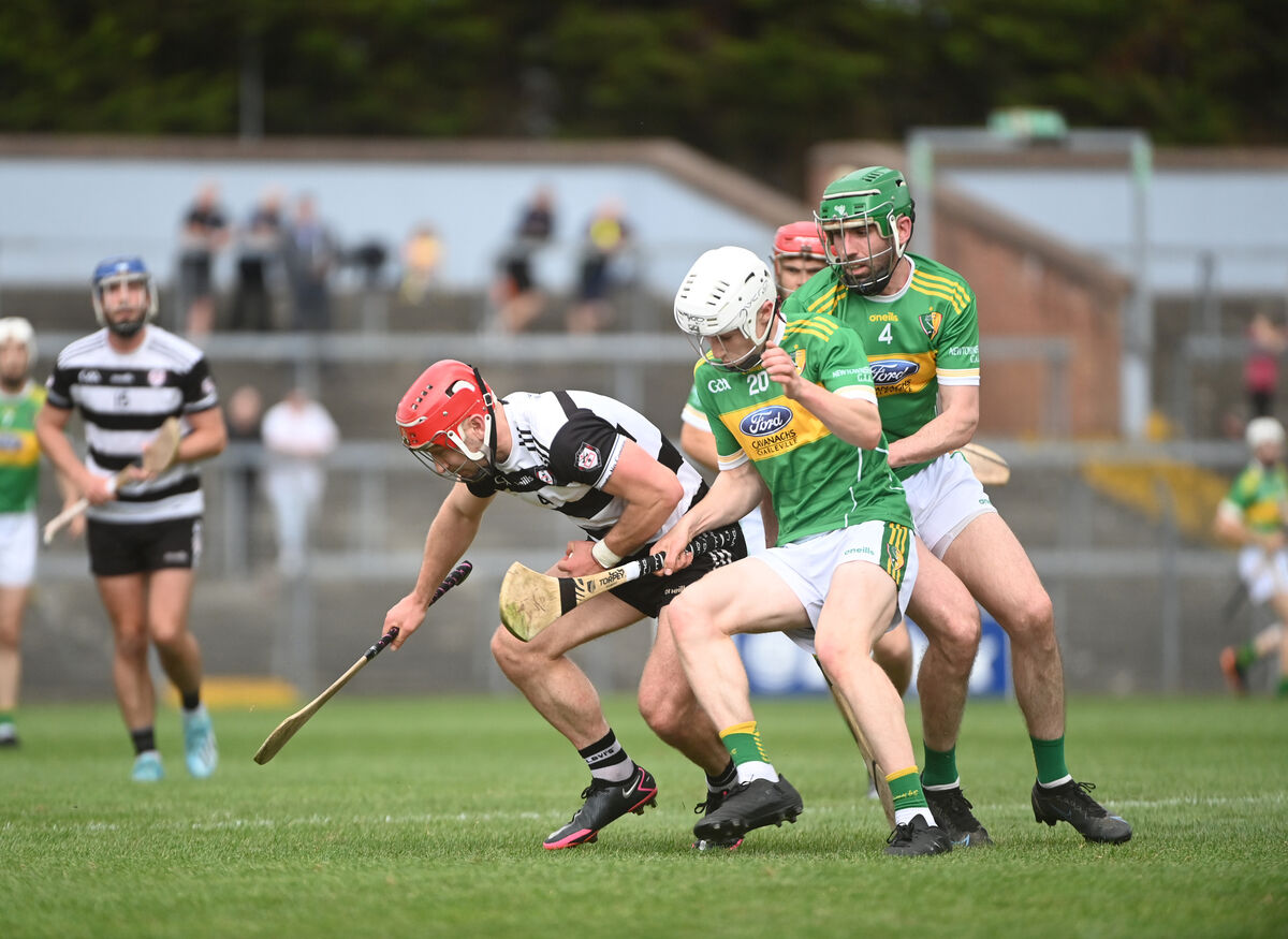 Seadnaidh Smyth, Midleton, and Rory Troy, Newtownshandrum, challenge for possession. Picture: Larry Cummins Seadnaidh Smyth, Midleton, and Rory Troy, Newtownshandrum, challenge for possession. Picture: Larry Cummins