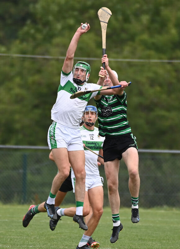 Kanturk's Aidan Walsh wins possession from Douglas's Cillian O'Donovan. Picture: Eddie O'Hare