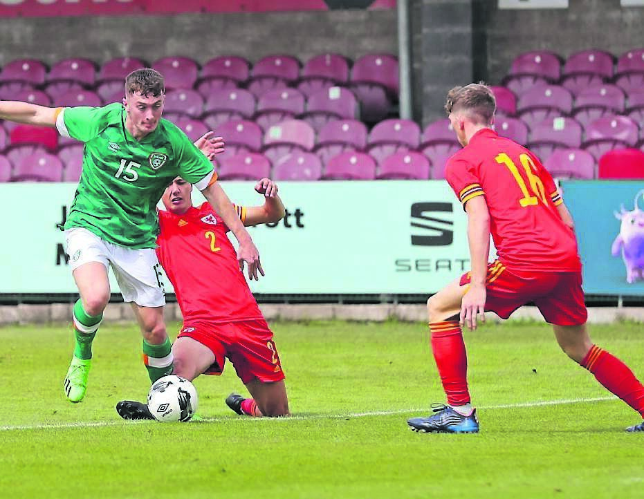Ireland’s Luke Casey skips past Wales’ Jake Cooke and Sam Rickett closes in during the Uefa Regions Cup amateur international friendly at Turner’s Cross. Picture: Jim Coughlan
Ireland’s Luke Casey skips past Wales’ Jake Cooke and Sam Rickett closes in during the Uefa Regions Cup amateur international friendly at Turner’s Cross. Picture: Jim Coughlan