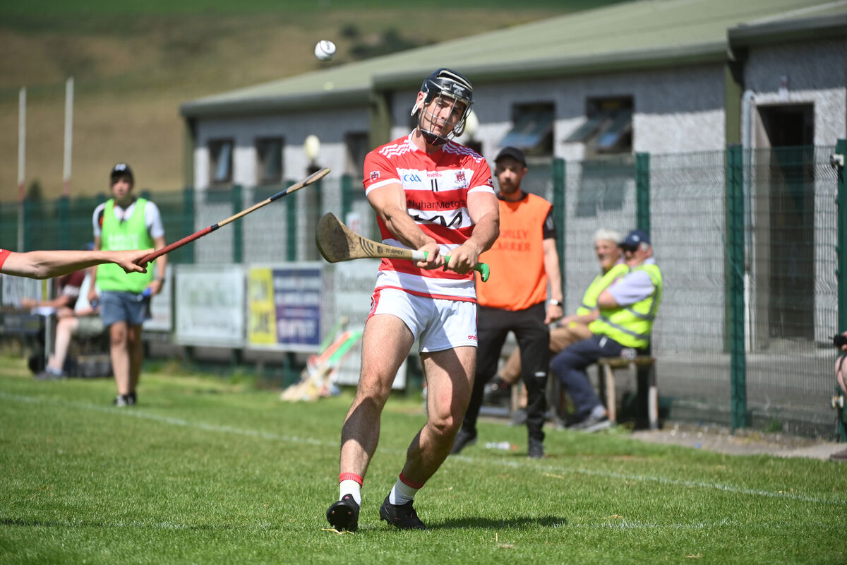  Sean Twomey fires the sliotar down the line for Courcey Rovers. Picture: Larry Cummins