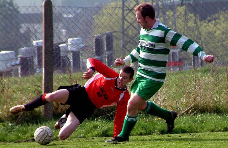 Leeside striker Ricky Gettings tries to keep the ball in play as Alan Kenneally closes in. Picture: Billy Lyons Leeside striker Ricky Gettings tries to keep the ball in play as Alan Kenneally closes in. Picture: Billy Lyons