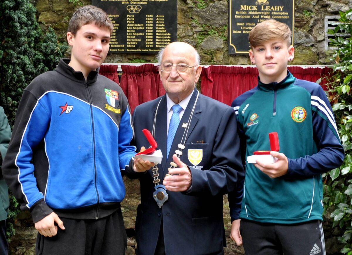 Riverstown BC boxers Eamer Coughlan and Callum Walsh receiving their Jack McAuliffe medals from the late Tim O’Sullivan during the Awards Ceremony in Bishop Lucey Park in 2016. Picture: Doug Minihane