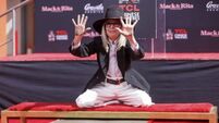 Diane Keaton recalls childhood dreams of Hollywood as she cements her handprints