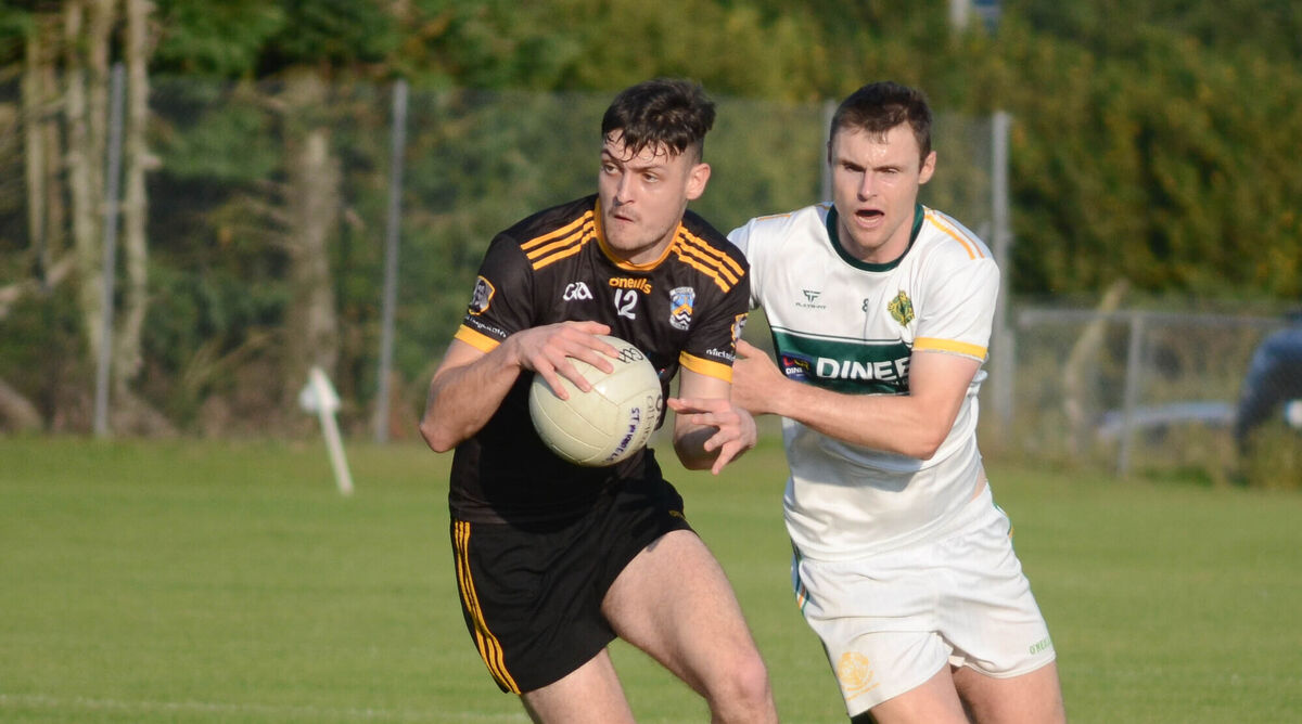 Fermoy's Dale Dawson breaks away from St Michael's Andrew Murphy. Picture: Howard Crowdy Fermoy's Dale Dawson breaks away from St Michael's Andrew Murphy. Picture: Howard Crowdy