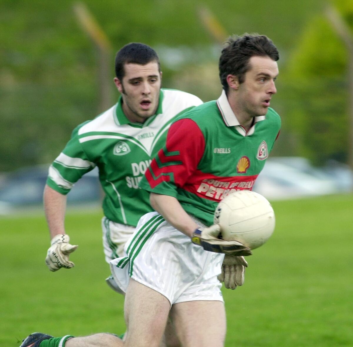 Tomas Conway, Ballinora, in possession ahead of Ballincollig's Eamonn Barry in an IFC clash in 2002. Picture: Brian Lougheed