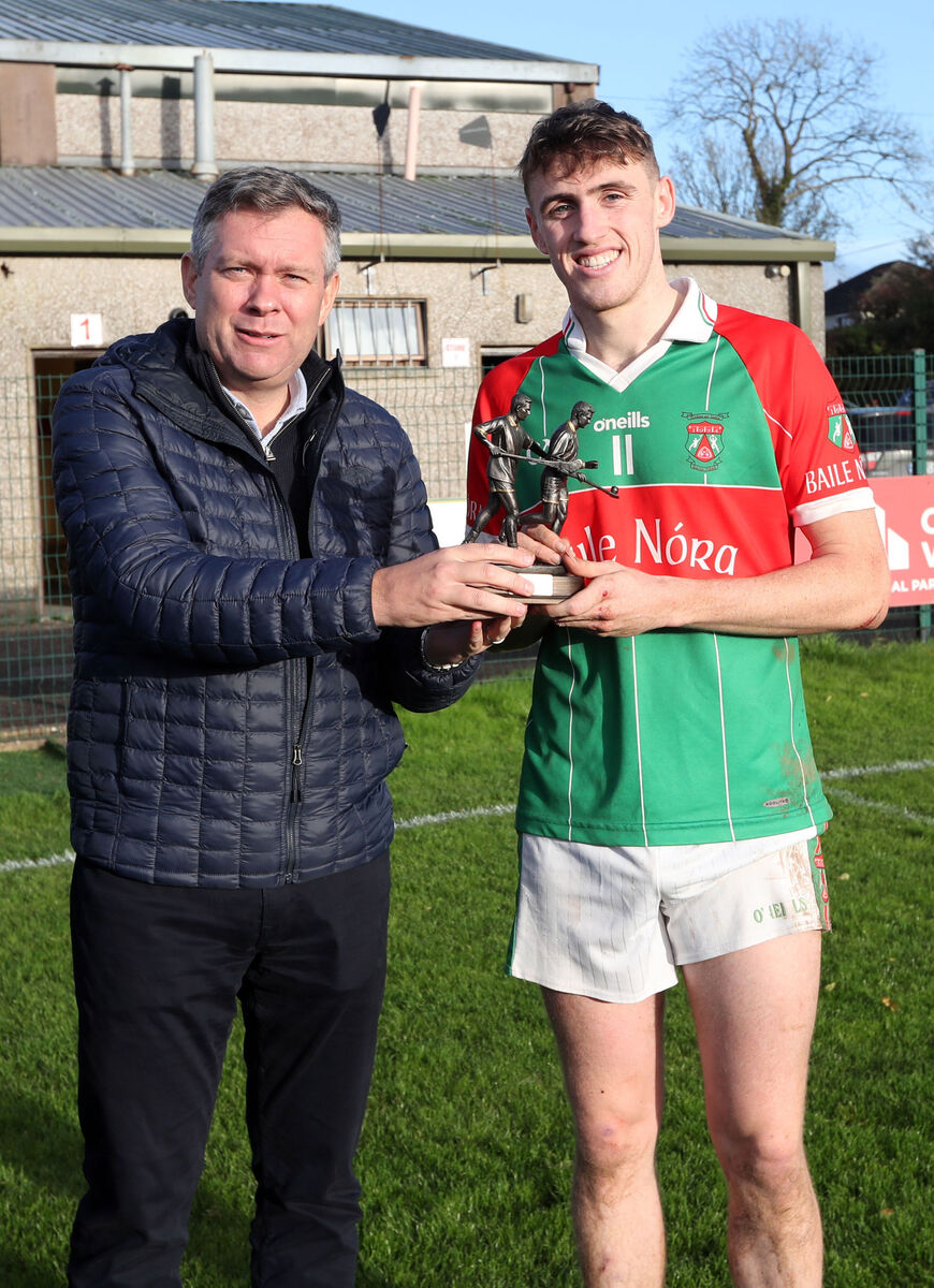 Bryan O'Donovan, MJK Oils presents the Man of the Match award to Darragh Holmes, Ballinora last season. Picture: Jim Coughlan.