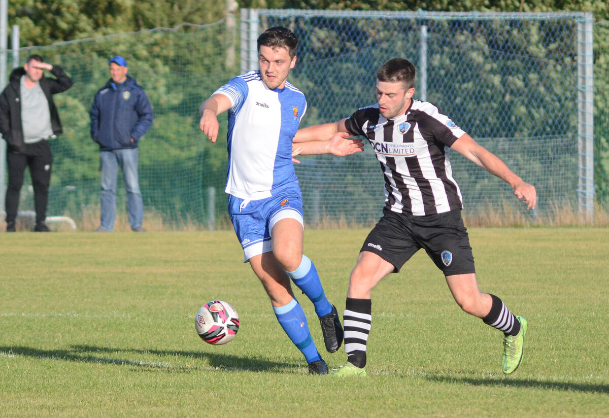 College Corinthians’ Dave O’Connor holds off St Mary’s Kyle O’Callaghan during their Beamish Stout Senior Centenary Cup match at St Mary’s Park. 	 Picture: Howard Crowdy
                    
