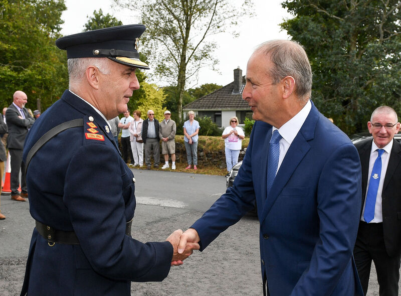 Taoiseach Micheál Martin TD, is welcomed by Chief Supt Tom Myers at the wreath-laying ceremony Taoiseach Micheál Martin TD, is welcomed by Chief Supt Tom Myers at the wreath-laying ceremony