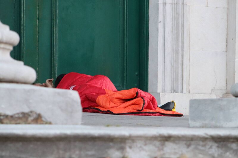 A homeless man sleeps on the steps of St Patrick's Church on the Lower Glanmire Road. Picture by David Doyle. A homeless man sleeps on the steps of St Patrick's Church on the Lower Glanmire Road. Picture by David Doyle.