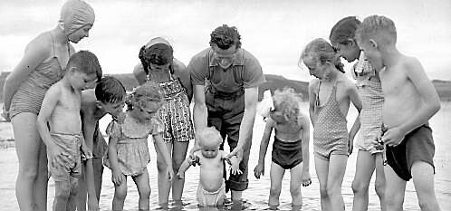 A group of bathers in Youghal on August 2, 1953
