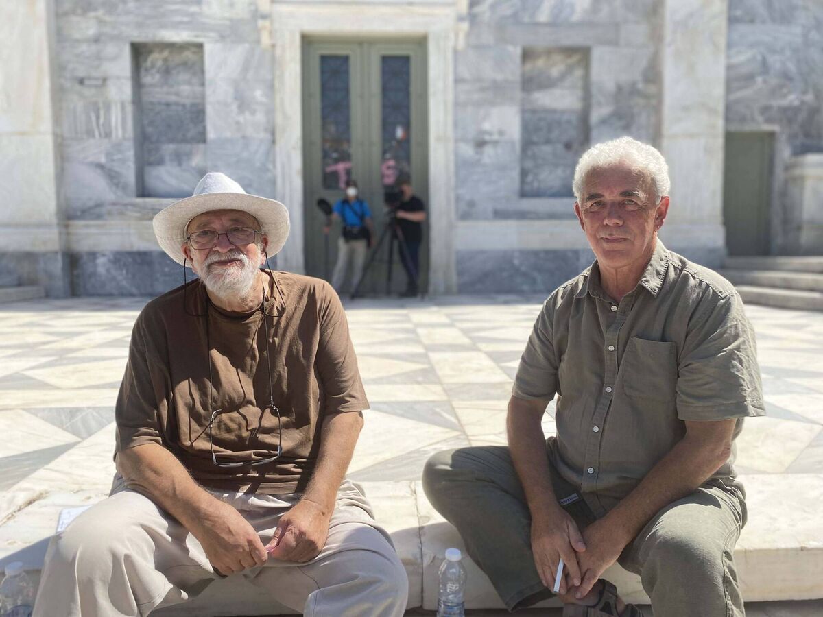 Distinguished Greek film maker Pantelis Voulgaris (left) with Cork poet Theo Dorgan who has written and presented the TG4 documentary An Buachaill Gealgháireach, which explores how Brendan Behan's tribute to Michael Collins became an anthem of resistance in Greece. Distinguished Greek film maker Pantelis Voulgaris (left) with Cork poet Theo Dorgan who has written and presented the TG4 documentary An Buachaill Gealgháireach, which explores how Brendan Behan's tribute to Michael Collins became an anthem of resistance in Greece.