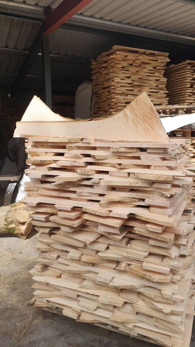 Ash after being prepared and stacked before being cut into hurleys at Fitzgerald Hurleys.