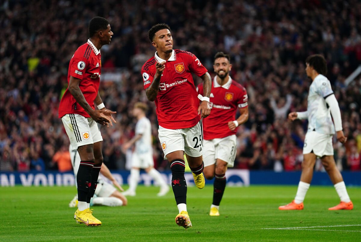 Manchester United's Jadon Sancho celebrates scoring the side's first goal of the game during the Premier League match at Old Trafford, Manchester. 
