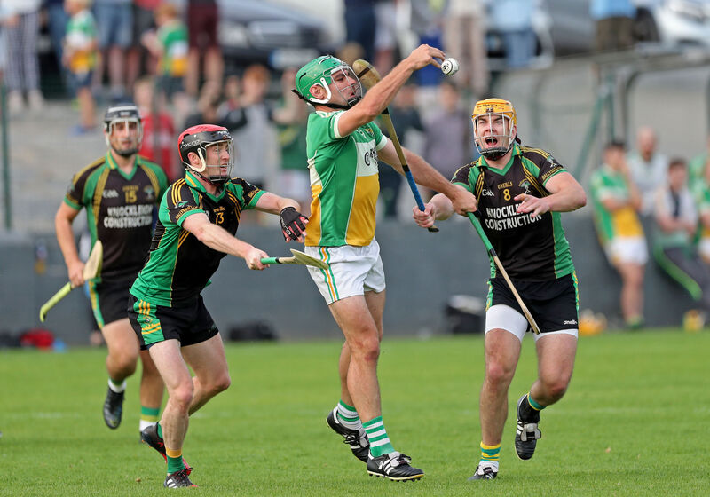  Daniel Dooley, Bride Rovers, passes away from Darren McCarthy and Seamus Corry, Ballymartle, in the SAHC at Riverstown. Picture: Jim Coughlan.