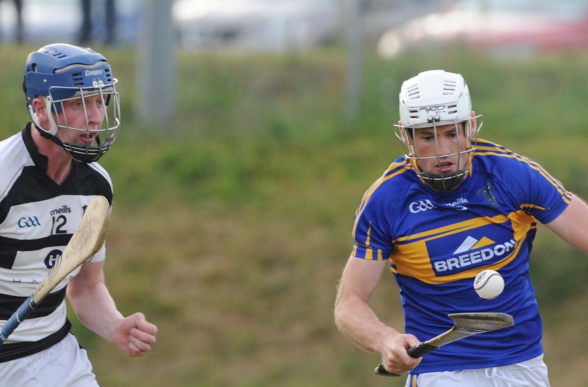 Carrigtwohill's Padraic Hogan takes on Ballyhea's Dion Curtin in the Co-Op Superstores Cork SAHC at Ballyanly. Picture: Denis Minihane. Carrigtwohill's Padraic Hogan takes on Ballyhea's Dion Curtin in the Co-Op Superstores Cork SAHC at Ballyanly. Picture: Denis Minihane.