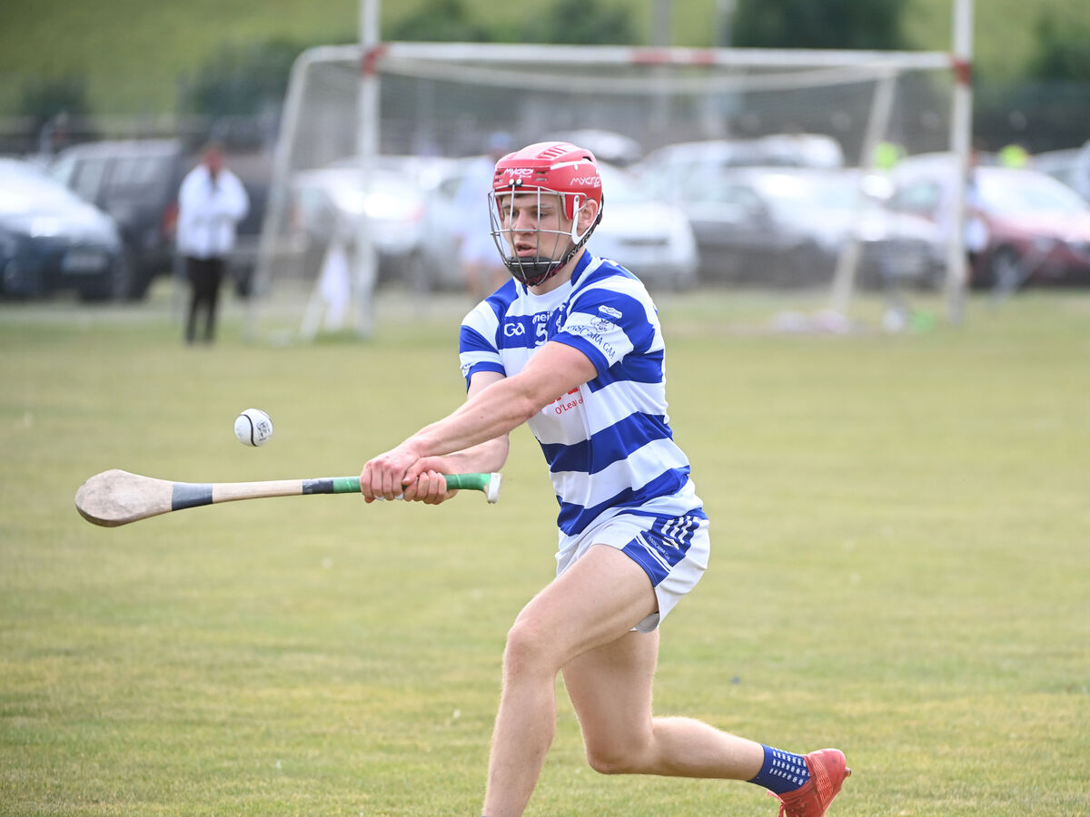  Jack Harrington, Inniscarra, makes a pass from the half-back line. Picture: Larry Cummins