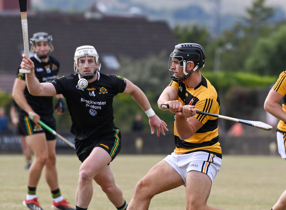 Na Piarsaigh's Cian Buckley clears his lines as Glen Rovers' Patrick Horgan closes in. Picture: David Keane. Na Piarsaigh's Cian Buckley clears his lines as Glen Rovers' Patrick Horgan closes in. Picture: David Keane.