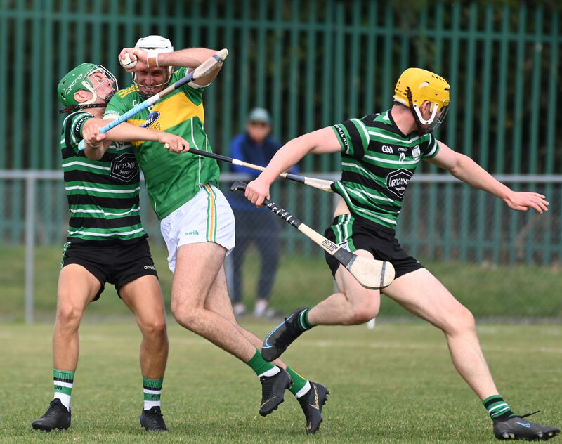 Newtownshandrum's Tim O'Mahony is tackled by Douglas' Andrew O'Connell and Daniel Harte. Picture: Eddie O'Hare Newtownshandrum's Tim O'Mahony is tackled by Douglas' Andrew O'Connell and Daniel Harte. Picture: Eddie O'Hare
