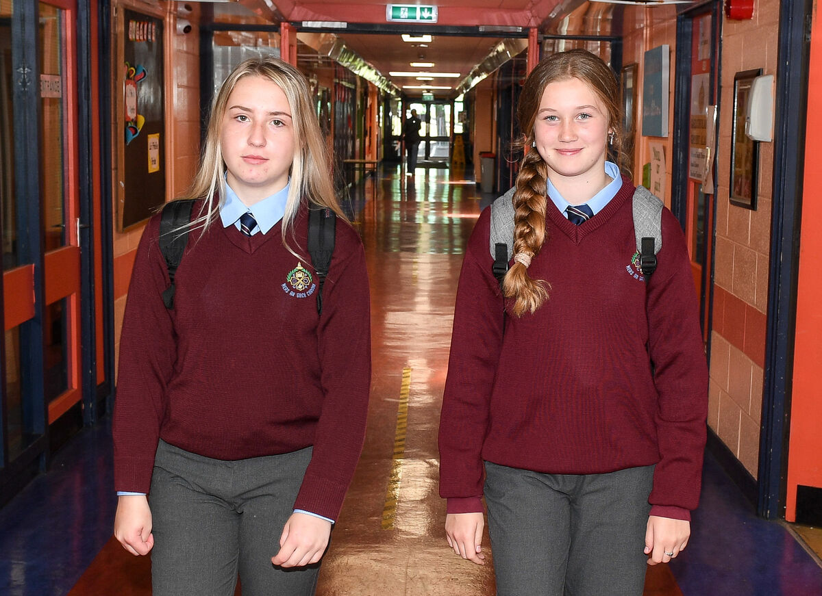  Transition-year students Leah Kelleher and Rebecca Meade, arriving for the return-to-school induction day at Mayfield Community School.Picture: David Keane.