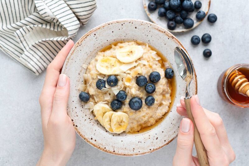 Oatmeal porridge with banana, blueberries and honey. Picture: Stock Oatmeal porridge with banana, blueberries and honey. Picture: Stock