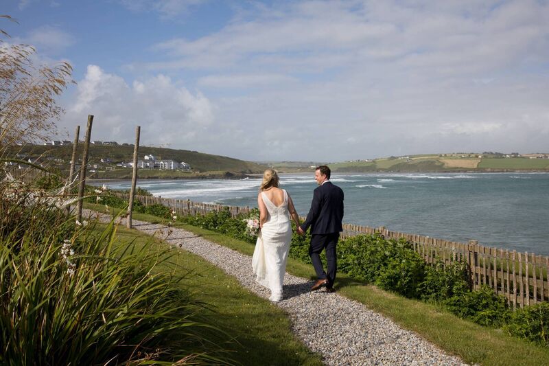 The couple walking hand in hand, near their reception, hosted at Dunmore House Hotel, in Clonakilty, West Cork. The couple walking hand in hand, near their reception, hosted at Dunmore House Hotel, in Clonakilty, West Cork.