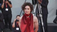 Timothee Chalamet wears backless jumpsuit at Venice Film Festival
