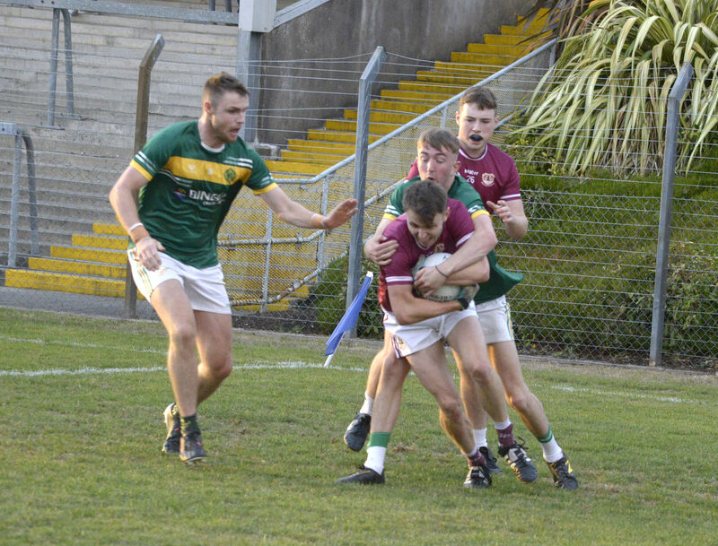 St Michael's Adam Hennessy tackling Dara Costello, Bishopstown. Picture: Denis Boyle