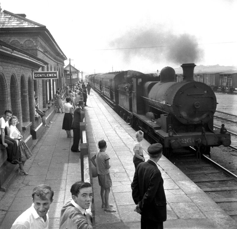 A train pulls into Youghal train station in 1959, around the time reader Tom Jones used to go to the seaside town on a day’s excursion with his family.