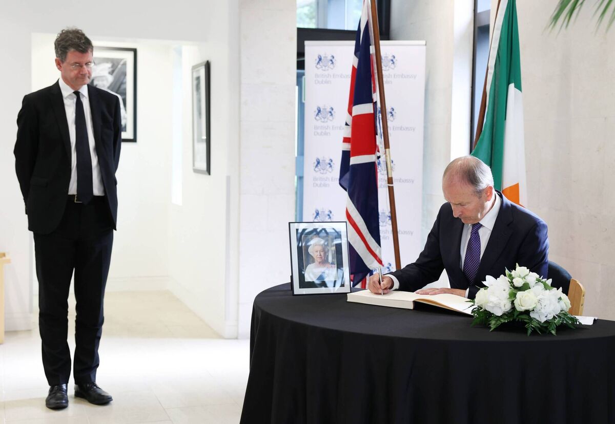Taoiseach Micheál Martin pictured with British Ambassador to Ireland Paul Johnston after signing a book of condolences in the British Embassy Dublin today 09 September 2022. Photograph: Government Information Service