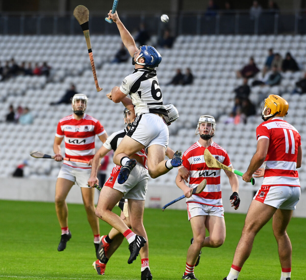  Ballyhea's Tom Hanley gets above Courcey Rovers' Olan Crowley. Picture: Eddie O'Hare