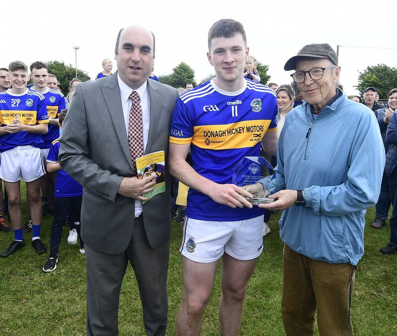 Luke Murphy receives the Duhallow JAFC Man of the Match award from Ned English, Castlecor Potatoes in the company of Steven Lynch, chairman, Duhallow Junior Board. Picture: John Tarrant Luke Murphy receives the Duhallow JAFC Man of the Match award from Ned English, Castlecor Potatoes in the company of Steven Lynch, chairman, Duhallow Junior Board. Picture: John Tarrant