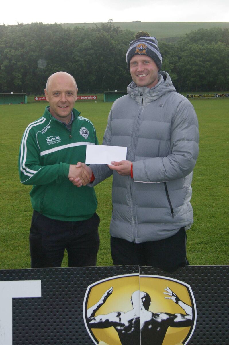 Eoin Fehily presents a sponsorship cheque to Ballincollig underage section chairman James Lynch. Eoin Fehily presents a sponsorship cheque to Ballincollig underage section chairman James Lynch.