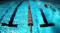 Swimming coach to face trial on sexual exploitation and child abuse imagery charges