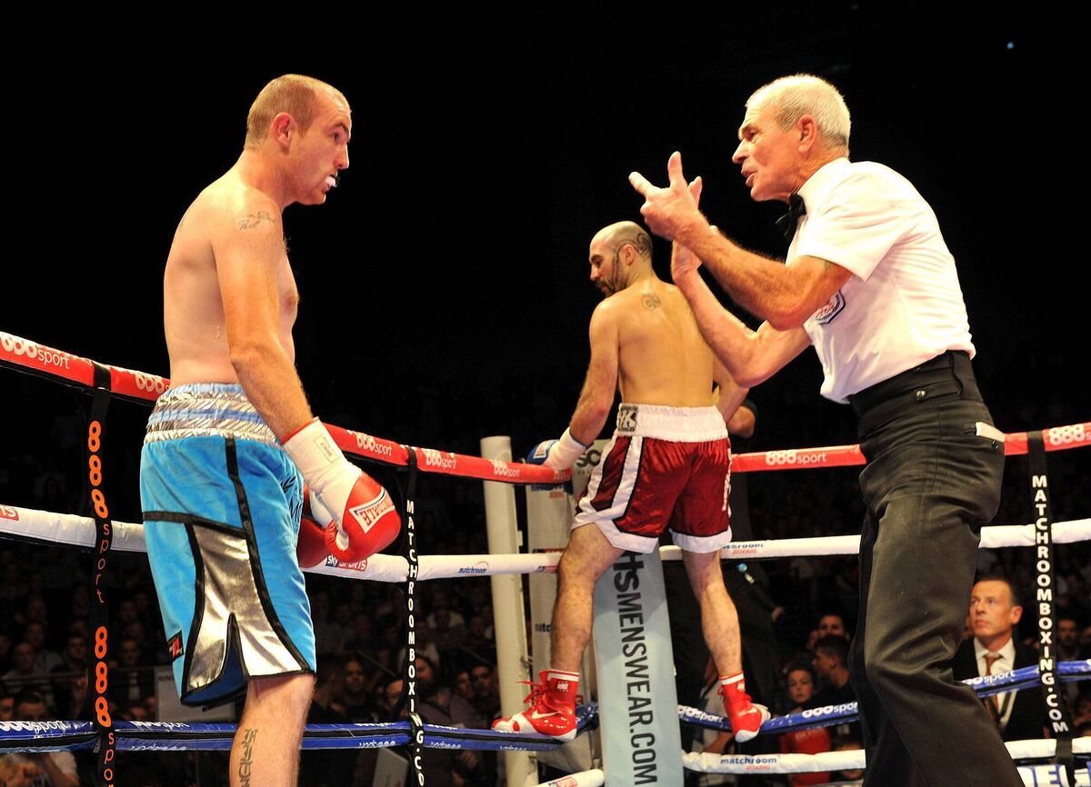 Gary 'Spike' O Sullivan gets the celebrations underway as referee Micky Vann counts out opponent Anthony Fitzgerald. Picture: Doug Minihane