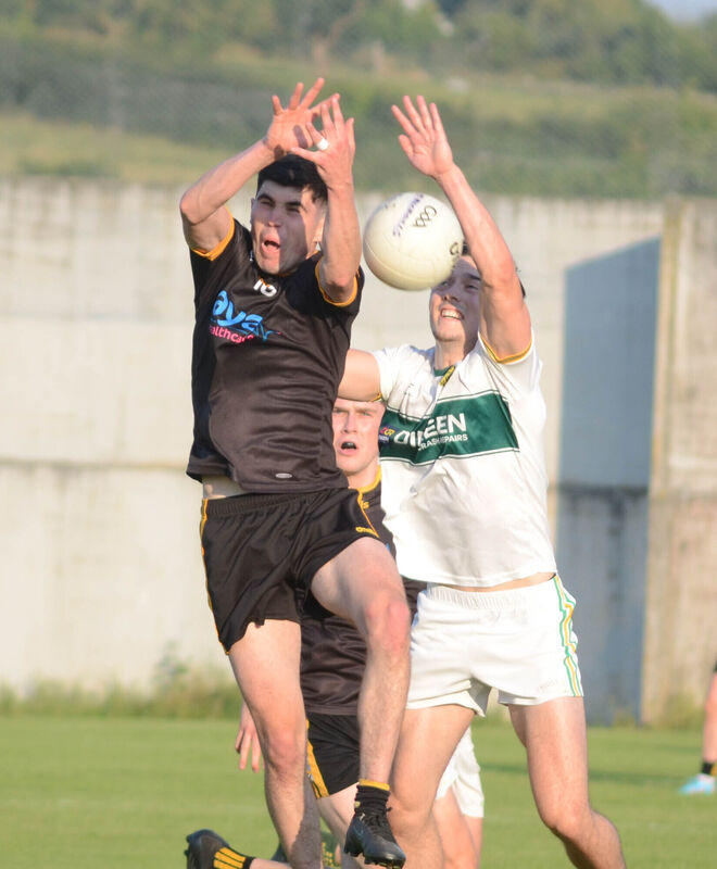 Fermoy's Martin Brennan and St Michael's Tom Linehan jump for a high ball. Picture: Howard Crowdy